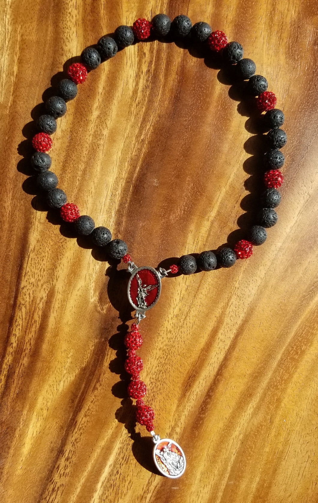 St. Michael Chaplet 10mm Black Lava Rock w/Bright Red Rhinestone Beads w/Enamel Red Centerpiece & Red Enamel Medal